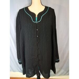 Maggie Barnes.  Turquoise tank top with black and Turquoise cover-up.